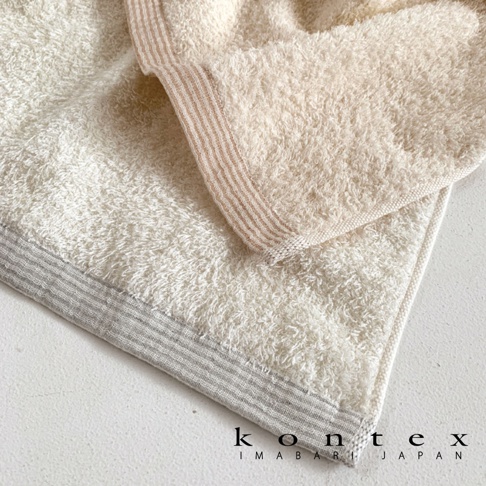 今治純棉手帕，柔軟細緻，帶有條紋滾邊，有奶油白和淺灰兩種顏色選擇。