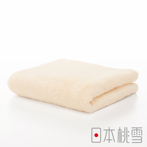 今治超長棉毛巾，淡黃色，材質柔軟蓬鬆，折疊展示於白色背景上。