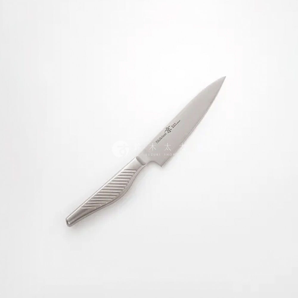 銀色不鏽鋼水果刀，刀柄有橫向防滑紋路，刀身上有「Shibata 京」及「SUZUKI SHOP」字樣。