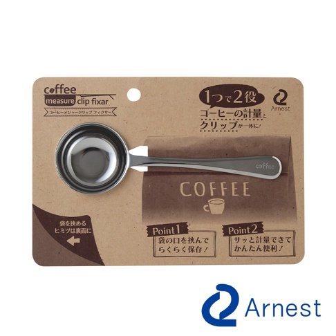 銀色不鏽鋼咖啡量匙與封口夾，設計簡約，量匙上印有「coffee」字樣，包裝紙板為咖啡色，印有日文說明及咖啡圖案。