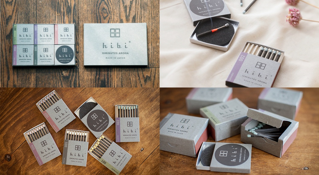 多款香氛火柴禮盒，火柴頭顏色包含綠、粉、藍，盒身為灰底搭配品牌標誌與日文說明。部分禮盒為五入組，火柴棒為深色，頂部有顏色標示。