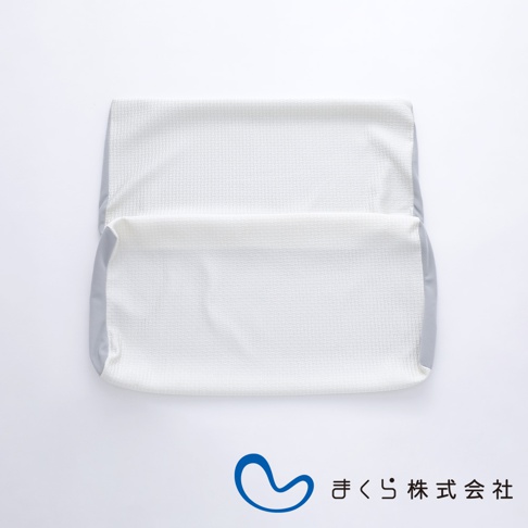 白色網格紋理的半身枕專屬枕套，兩側有淺灰色邊緣，材質觸感柔軟。