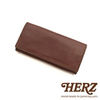 職人手作皮革軟皮長夾 WL-63，呈現經典棕色，材質為柔軟皮革，邊緣有精緻縫線，簡潔的設計展現皮革質感。