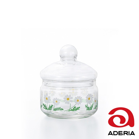 昭和復古風格小玻璃儲物罐，透明玻璃罐身飾有白色小雛菊與綠色葉子的圖案，附有圓形頂蓋。