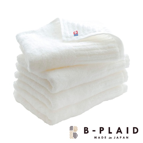 一疊白色 RIB 今治長毛柔暖速乾直紋浴巾，其中一條的織標上印有紅色和藍色的標誌。