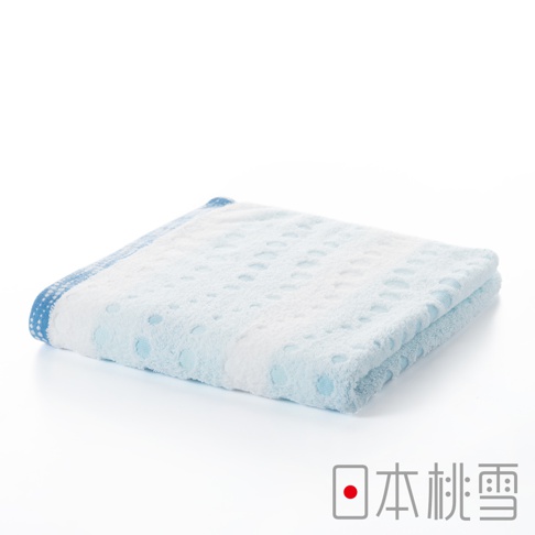 今治水泡泡毛巾，淺藍色，材質柔軟，表面有圓點紋路，邊緣有藍色滾邊。
