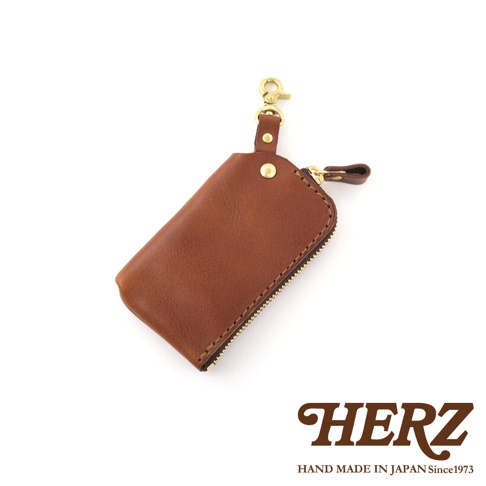 職人手作皮革鑰匙包，棕色皮革，附有黃銅鑰匙圈和拉鍊。