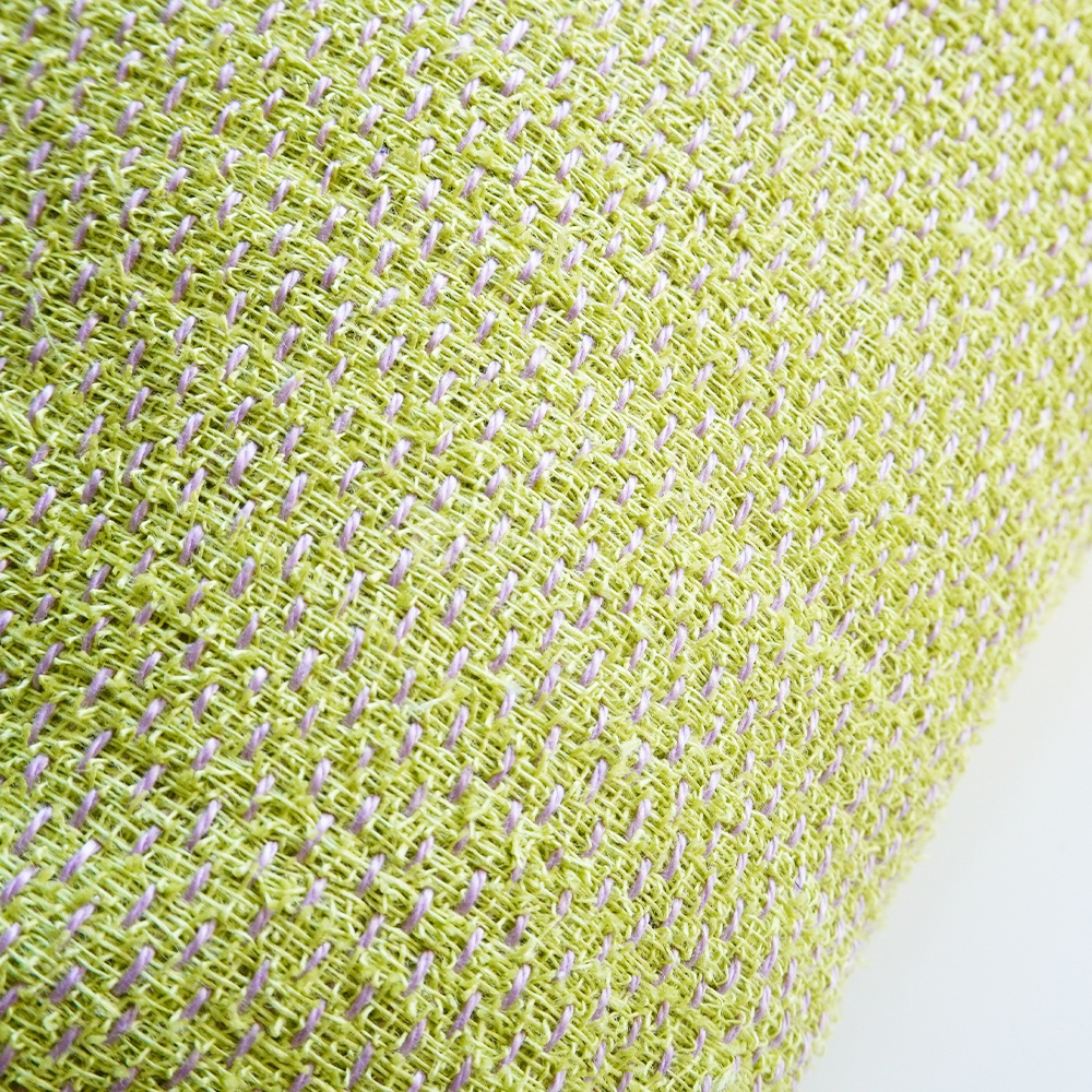 綠色蚊帳棉裂織材質的特寫