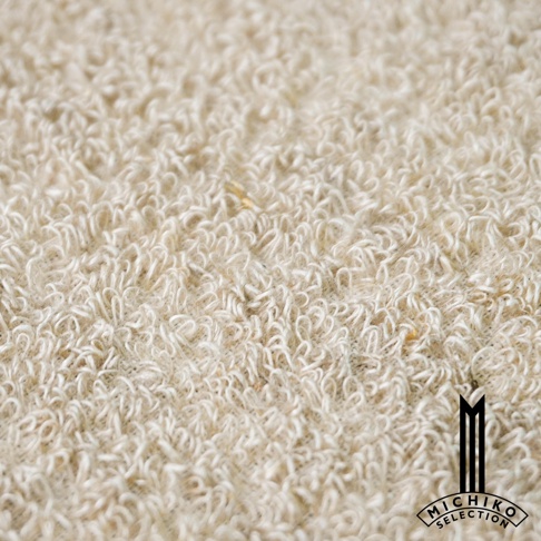 MICHI KO SELECTION 標誌置於左下角，背景是淺米色、毛圈織物的細節特寫，材質看起來柔軟蓬鬆。