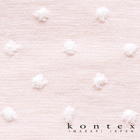 淺粉色無撚紗質地，帶有白色小圓點紋理，質地輕柔透氣。