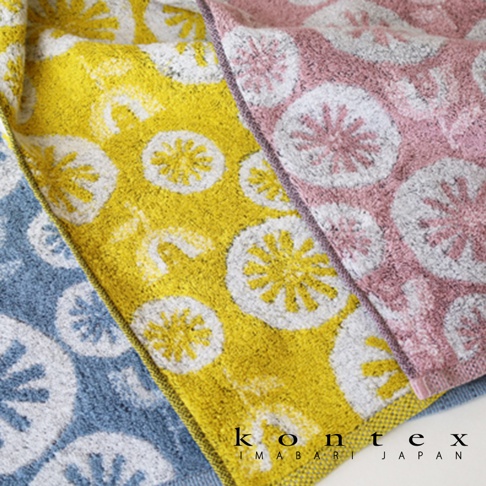 模式B： 三條色彩繽紛的毛巾，分別為藍色、黃色及粉紅色，皆印有白色和黃色交織的圓形花朵圖案，下方可見 KONTEX IMABARI JAPAN 的品牌標誌。