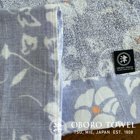 朧染和紋款待之心紗布毛巾，標有津OBORO TSU, MIE, JAPAN EST. 1908 字樣