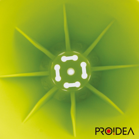 亮綠色消音高歌器，內部結構為圓形中心，周圍有八個放射狀的葉片，中心圓上設有四個長條形白色開孔，整體材質為塑膠。