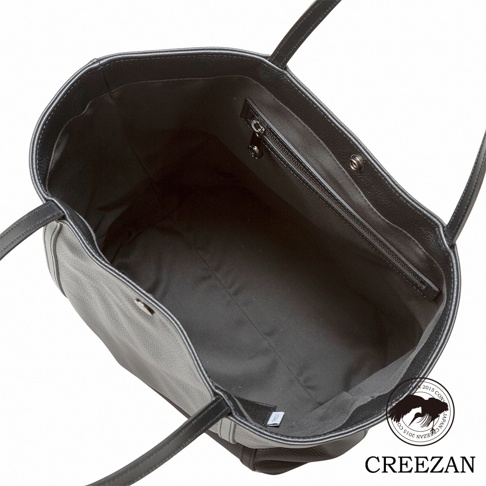 JETTER 大容量黑色皮革肩背托特包，內部為黑色內襯，設有拉鍊暗袋及磁釦設計。