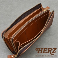 職人手作皮革Organ大容量拉鍊長夾，展現內部多層隔層與卡槽設計，整體為棕色調，搭配精緻的金色拉鍊，展現質感。