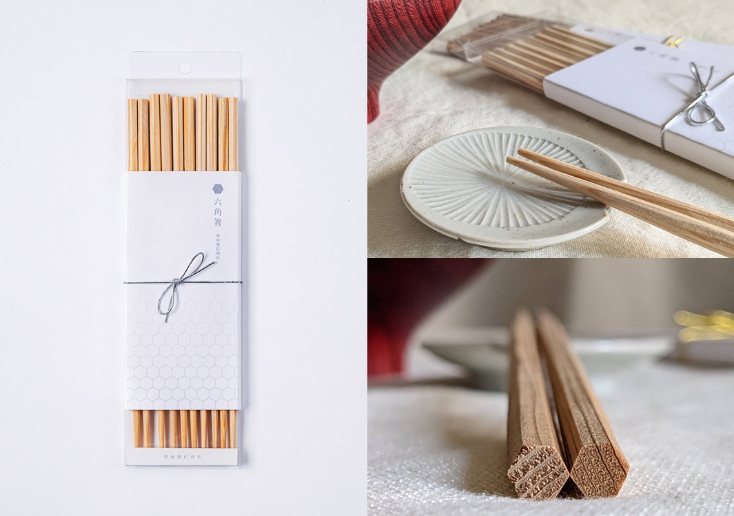 兩雙淺棕色木質六角形筷子，一雙放在白色陶瓷筷架上，另一雙並列展示，呈現細膩的木紋。