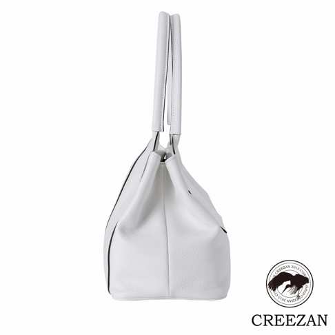 JETTER 方形托特包 CJTE-026，白色皮革材質，側面視角，搭配同色系提把，包身簡潔，底部有品牌標誌。