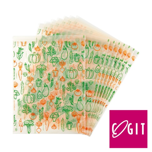 一疊米糠蔬果環保鮮綠袋，袋身印有綠色和橘色線條描繪的各式蔬果圖案，如南瓜、紅蘿蔔、青椒、玉米、蘆筍、茄子、番茄、洋蔥、花椰菜、豌豆莢等。