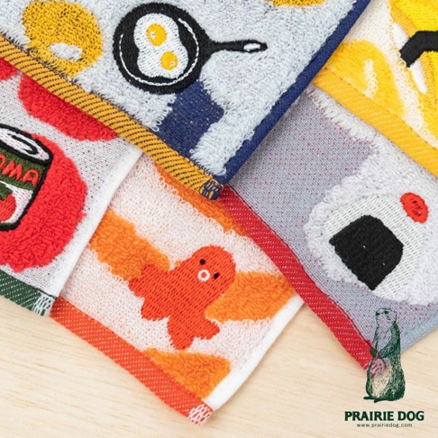 數條今治提花刺繡方巾，分別繡有鍋中煎蛋、飯糰、番茄罐頭及可愛小雞圖案