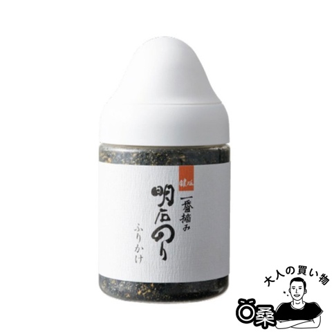 圓形透明瓶裝，白色瓶蓋，瓶身貼有白色標籤，標籤上印有日文文字，瓶內裝有深色芝麻海苔香鬆。