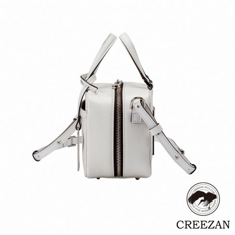 JETTER 迷你箱型包 CJTF-038，白色荔枝紋皮革材質，設有雙提把、頂部拉鍊開口及可拆卸斜背帶，整體造型方正簡潔。