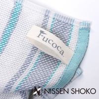 今治純棉廚房擦拭巾，織有藍綠色、灰色與白色的條紋，帶有「Fucoca.」品牌標籤。