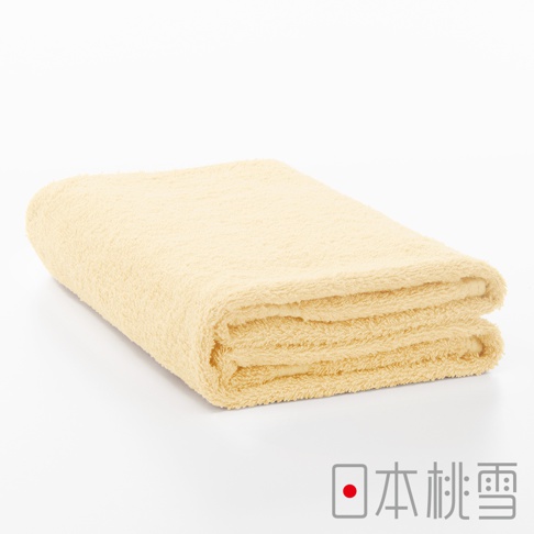 一張淺黃色浴巾，材質為毛巾布，乾淨地對折放置，呈現柔軟的質感。