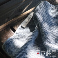 日本桃雪SEK抗菌防臭檜木鬆餅紋連帽浴巾，帶有品牌標籤。