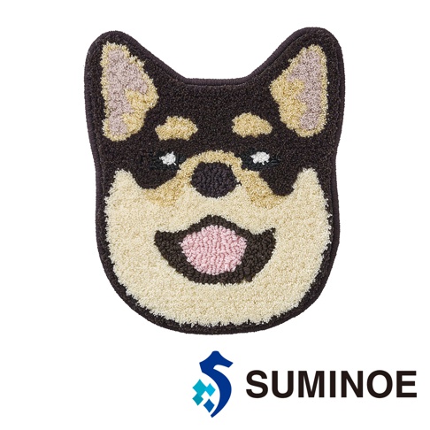 這是一款 SUMINOE 品牌的 INUKAO 狗狗造型椅墊，外觀為可愛的柴犬頭部造型，採用毛絨材質製作，以深褐色為主色調，搭配奶油色與粉紅色的面部細節，整體呈現正面視角，並在下方標註有 SUMINOE 的品牌標誌。