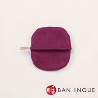 紫色蚊帳質地防燙鍋套，帶有織帶提把。