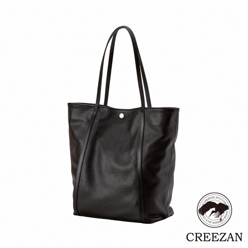 JETTER 大容量肩背托特包 CJTE-025，黑色荔枝紋皮革材質，配有兩個細長肩背帶，包身中央有一個銀色圓形金屬鈕扣。