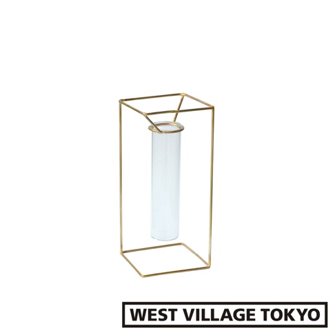 黃銅四角結構支撐著一個透明玻璃試管，用於插花。