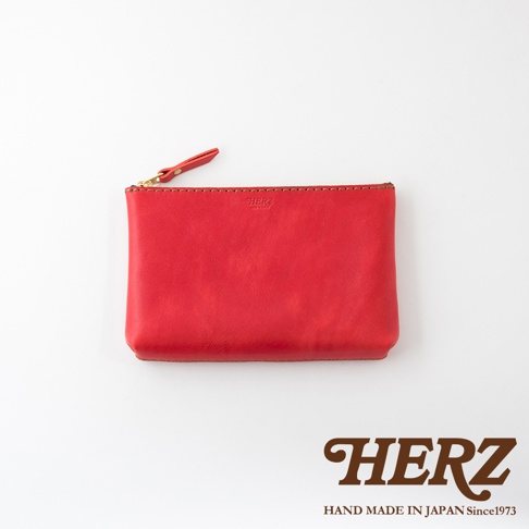 職人手作皮革長方形拉鍊收納包，紅色，簡約設計，搭配金色拉鍊，可容納隨身小物。