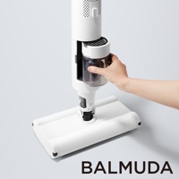 白色無線吸塵器，手部正將集塵盒插入機身，底部為寬扁的吸頭，整體設計簡潔。