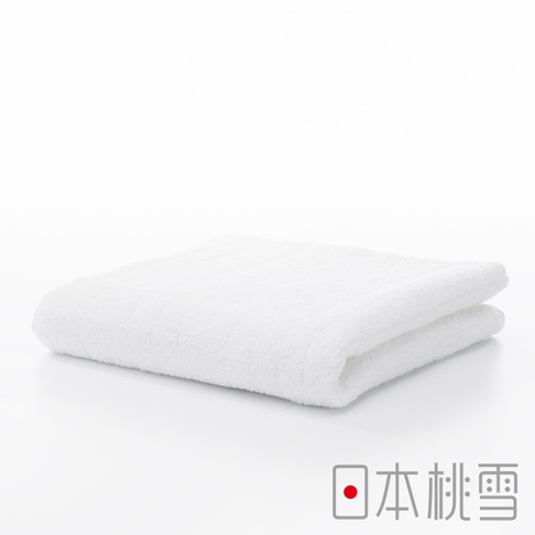 一張白色今治超長棉毛巾，柔軟蓬鬆，對折放置於白色背景上，右下角有「日本桃雪」的標誌。