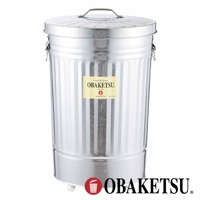 OBAKETSU 附輪垃圾桶，銀色金屬材質，帶有品牌標籤，下方有小輪子。