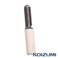KOIZUMI 品牌 mini 瀏海梳，採用粉嫩色系手柄搭配灰粉色梳齒，設計精巧便於攜帶。