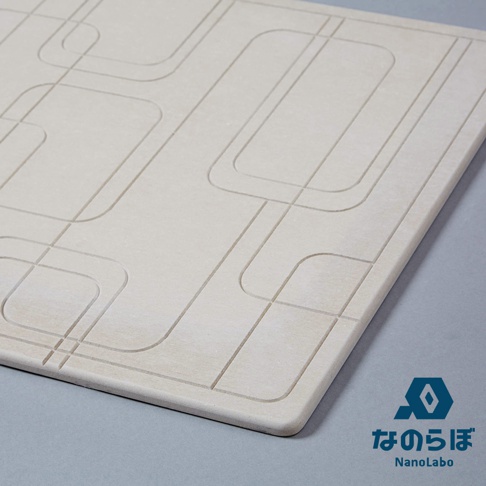 UB珪藻土瞬間吸水地墊+鞋靴除濕墊組合，圖片中的地墊帶有連續的線條圖案，右下角標示品牌為「なのらぼ NanoLabo」。