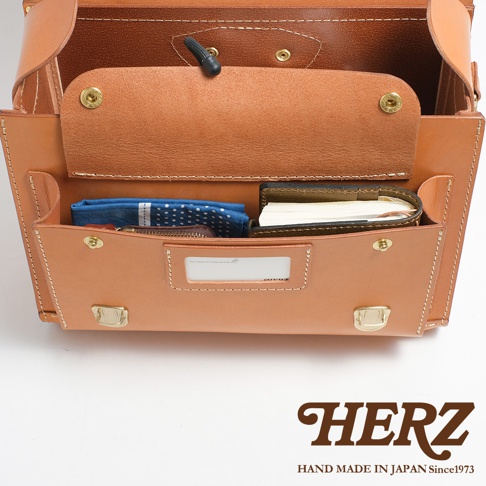 HERZ 品牌標誌，下方有 HAND MADE IN JAPAN Since1973 字樣。