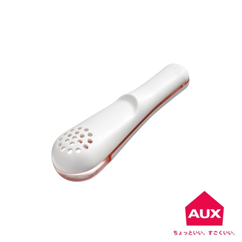 白色塑膠製的leye 方便鹽匙，帶有玫瑰金飾邊。前端有一個帶有多個圓形孔的撒鹽頭，整體設計簡潔。