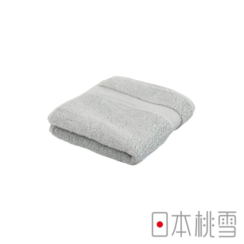 淺灰色今治匹馬棉方巾，材質柔軟，表面有織紋，中間有一條較光滑的織帶，整齊對折。