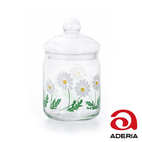 透明玻璃儲物罐，帶有白色雛菊與綠色葉子圖案，附有玻璃蓋。