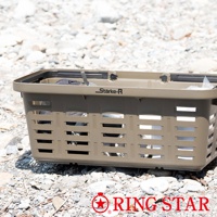 Starke-R 超級長籃，由堅固的棕褐色塑膠製成，兩側有長方形鏤空設計，頂部有黑色提把和扣環，籃內可見部分物品。