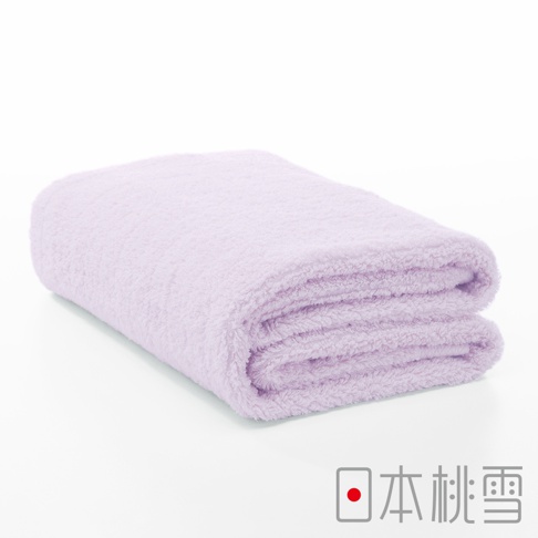 一條淺紫色、觸感柔軟的今治超長棉浴巾，折疊整齊，置於白色背景上。