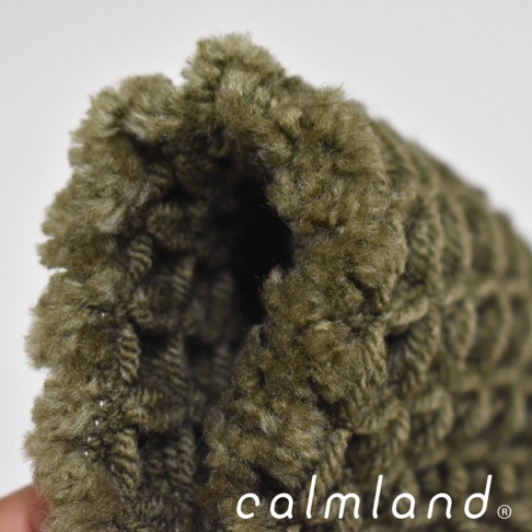 橄欖綠色鬆餅紋瞬乾吸水浴墊，材質柔軟，表面有立體紋理。