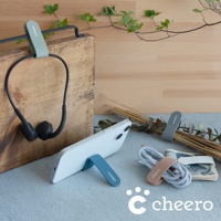 五個萬能QQ變形夾，顏色包含鼠尾草綠、灰、粉紅和藍色，材質為矽膠，用於固定耳機、手機支架及綑綁充電線。