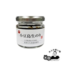 透明玻璃罐裝盛著深褐色佃煮海苔醬，瓶蓋為銀色金屬材質。白色標籤上印有日文產品資訊。