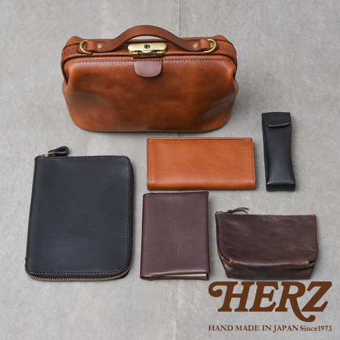 日本HERZ品牌手工皮革多款皮夾、筆袋與小包，及一個棕色皮革醫生包。