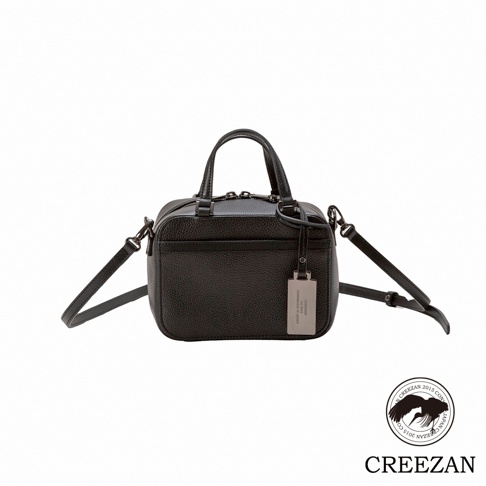 JETTER 迷你箱型包 CJTF-038，黑色皮革材質，具備雙提把與可拆卸斜背帶，附有金屬吊牌。