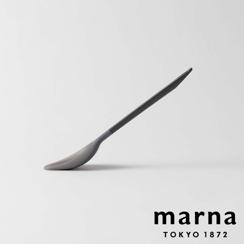 Marna Tokyo 1872 logo below a grey silicone cooking spoon with a triangular handle.